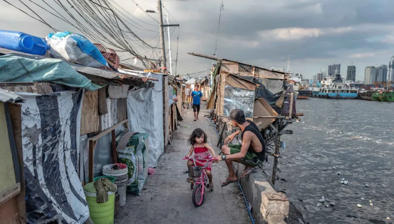 Habitants du bidonville de Baseco dans le district de Tondo à Manille, Philippines